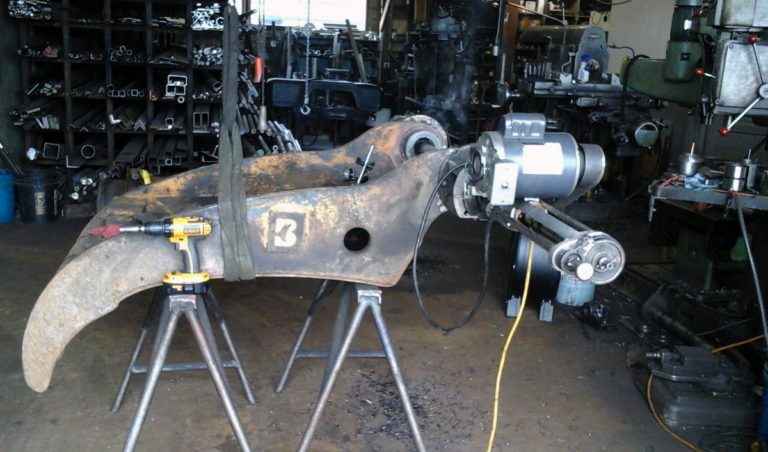 Large metal claw in repair shop